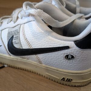 Nike Air White Leather Sneakers with Black Swoosh